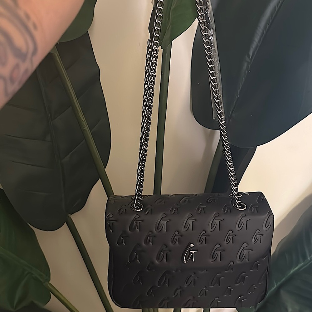 Glamaholic “flap bag” medium size.